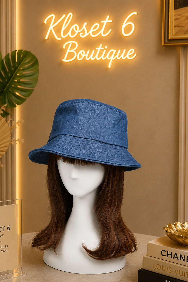 Blue bucket hat on a mannequin head with 'Kloset 6 Boutique' neon sign in the background Main image